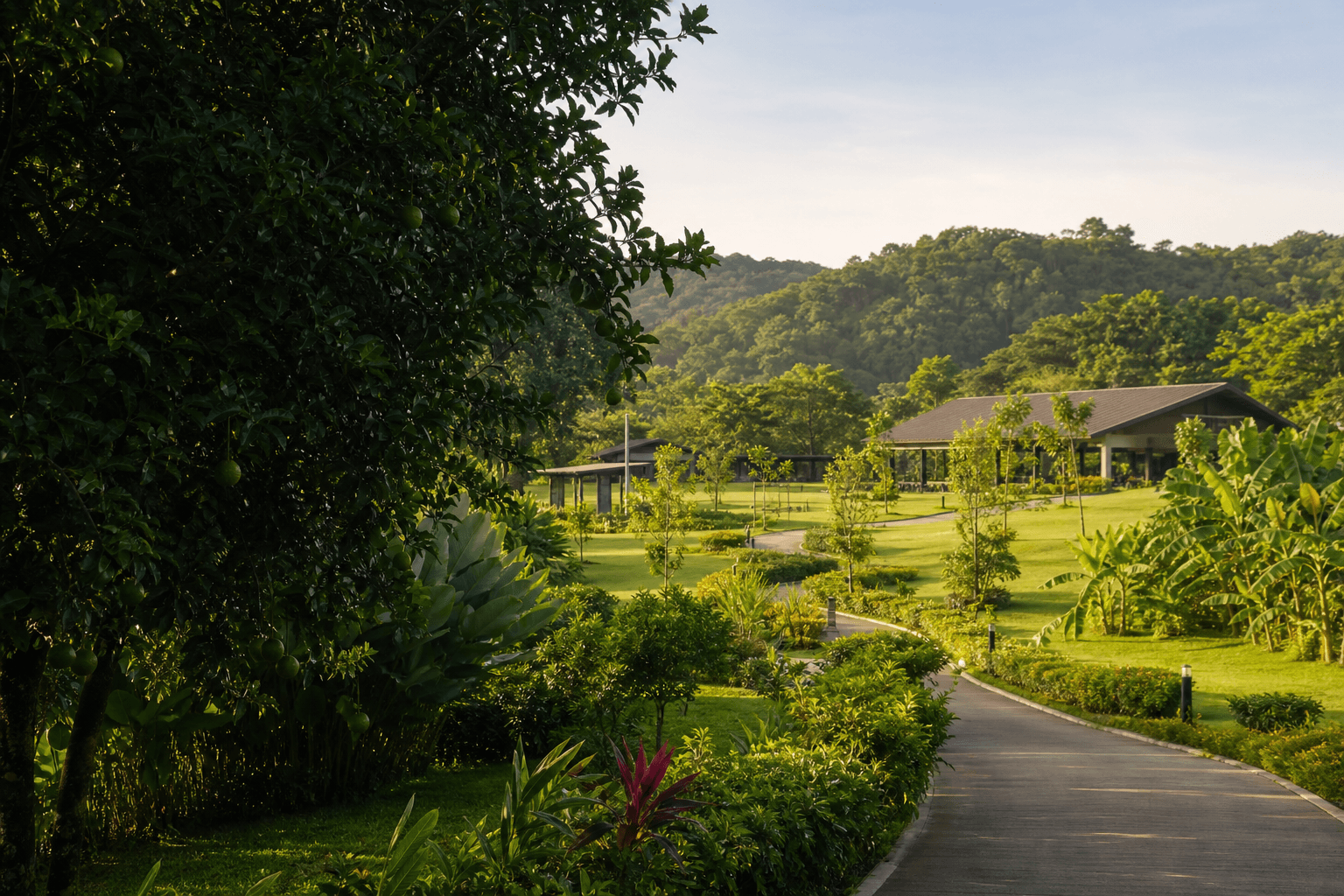A tropical agro-tourism park with fruit trees, walking paths and green lawns